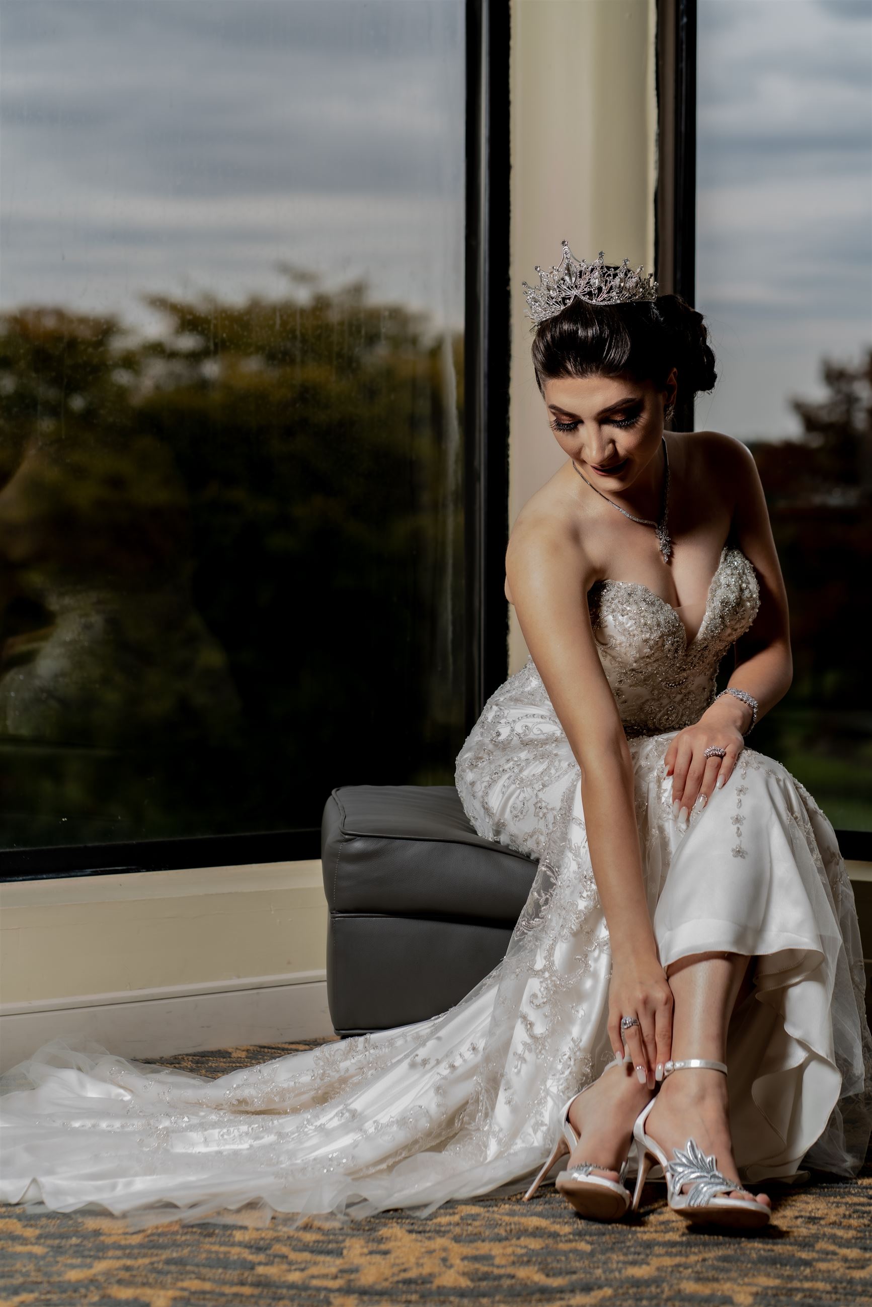 Bride Putting On Her Wedding Shoes