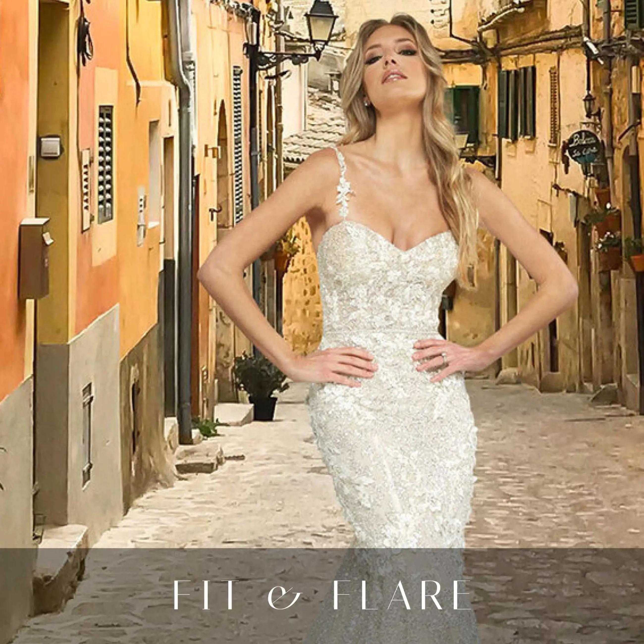 Model wearing a gown by Fit & Flare