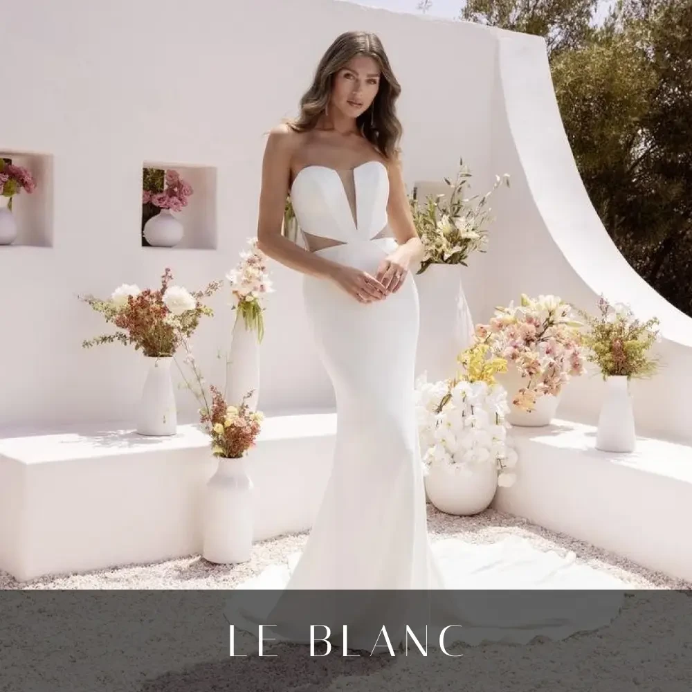 Model wearing a gown by Le Blanc